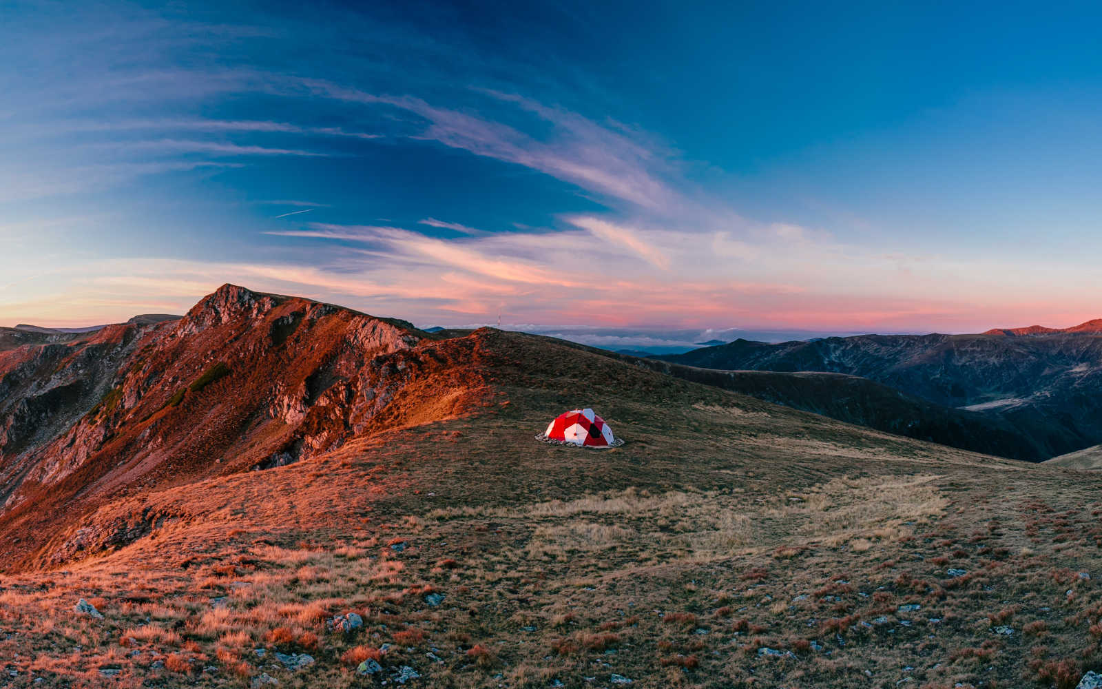 Mountain with remote tent